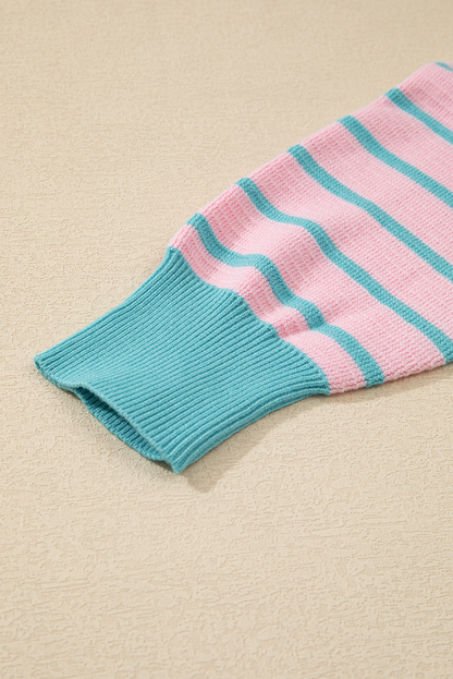 Pull ample à rayures roses, col rond et épaules tombantes