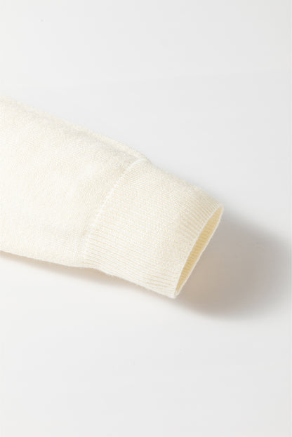 Cardigan boutonné à rayures blanches et motifs colorés sur le devant