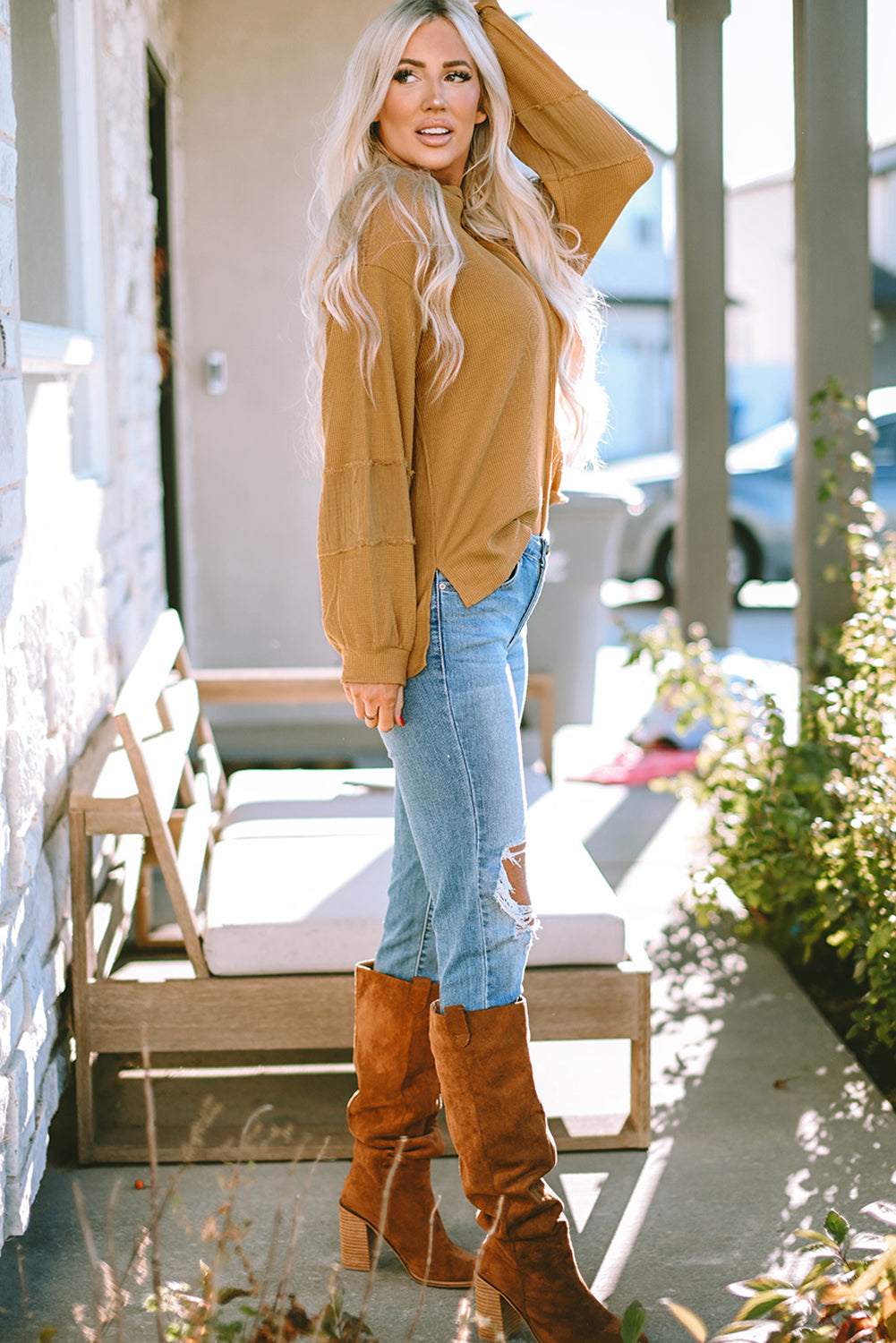 Haut en tricot gaufré à manches bouffantes et coutures apparentes