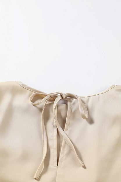 Blusa elegante de manga larga con cuello vuelto negro