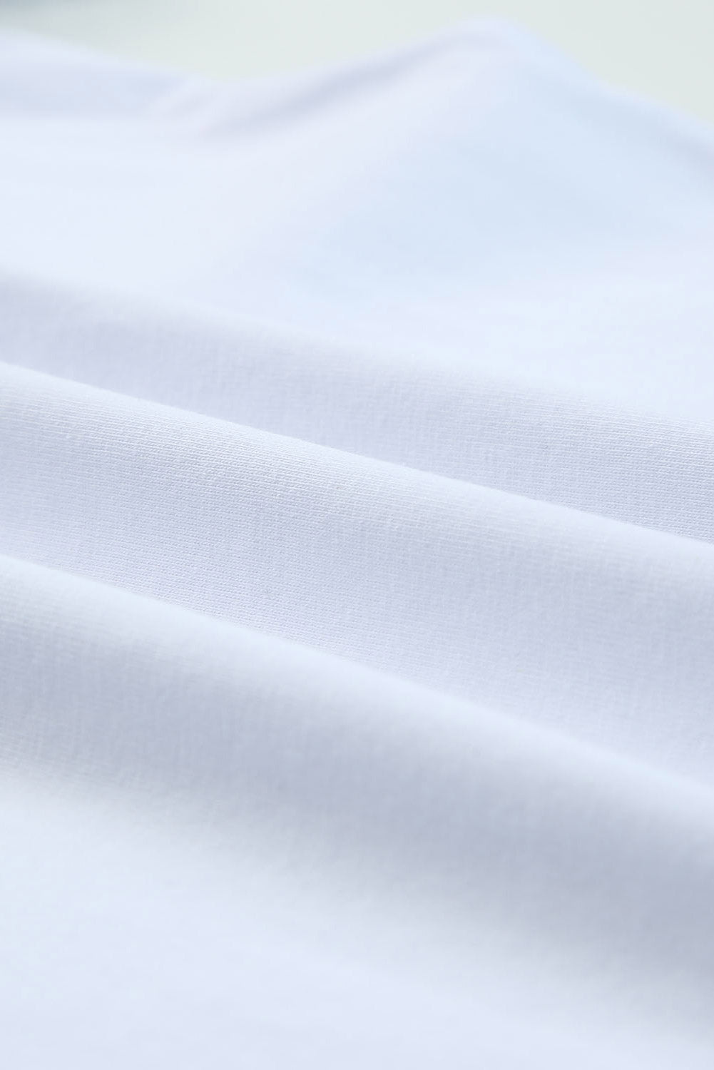 Camiseta con cuello en V y mangas abullonadas 