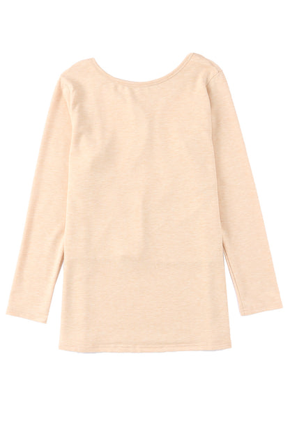 Top tejido de manga larga con espalda abierta