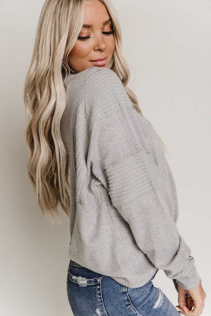 Haut Henley gris à manches dolman et patchwork gaufré 