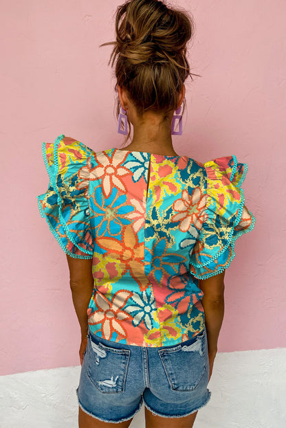 Blusa con mangas con volantes y estampado floral vibrante multicolor