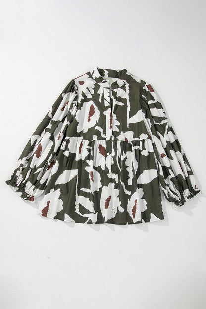 Chemisier à manches bouffantes et demi-bouton à imprimé floral abstrait trèfle à quatre feuilles