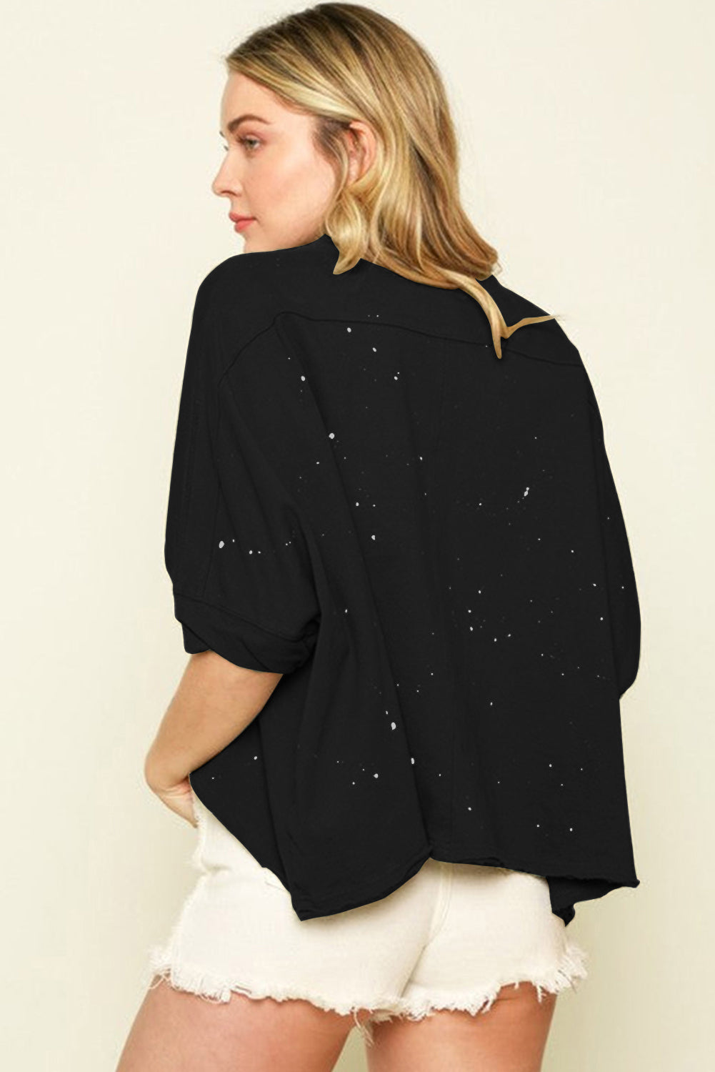 Haut à manches courtes et ourlet asymétrique délavé et vieilli