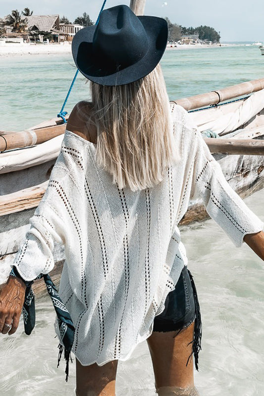 Pull ample à col en V et détails creux blancs 