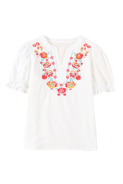 Blusa de manga farol con volantes y bordado floral 