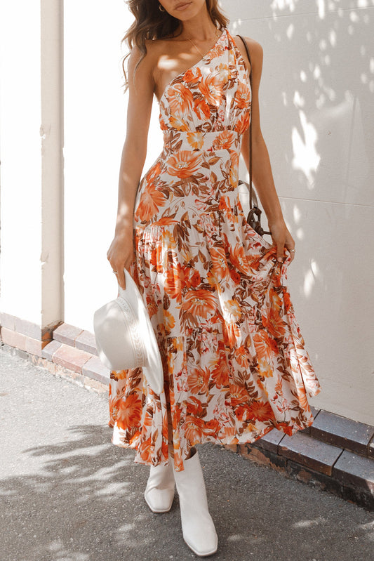 Vestido largo plisado con estampado floral y cintura alta con un hombro
