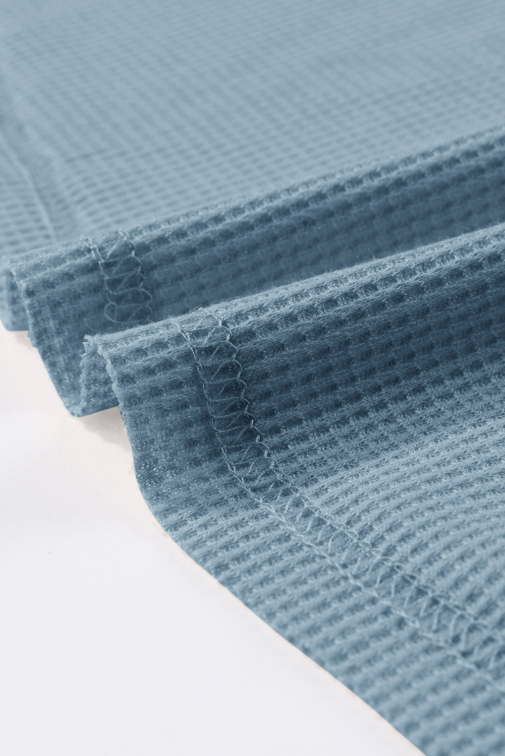 Top de manga larga con botones de punto tipo gofre marrón 