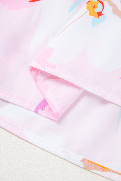 Robe longue smockée à imprimé floral rose et épaules nouées