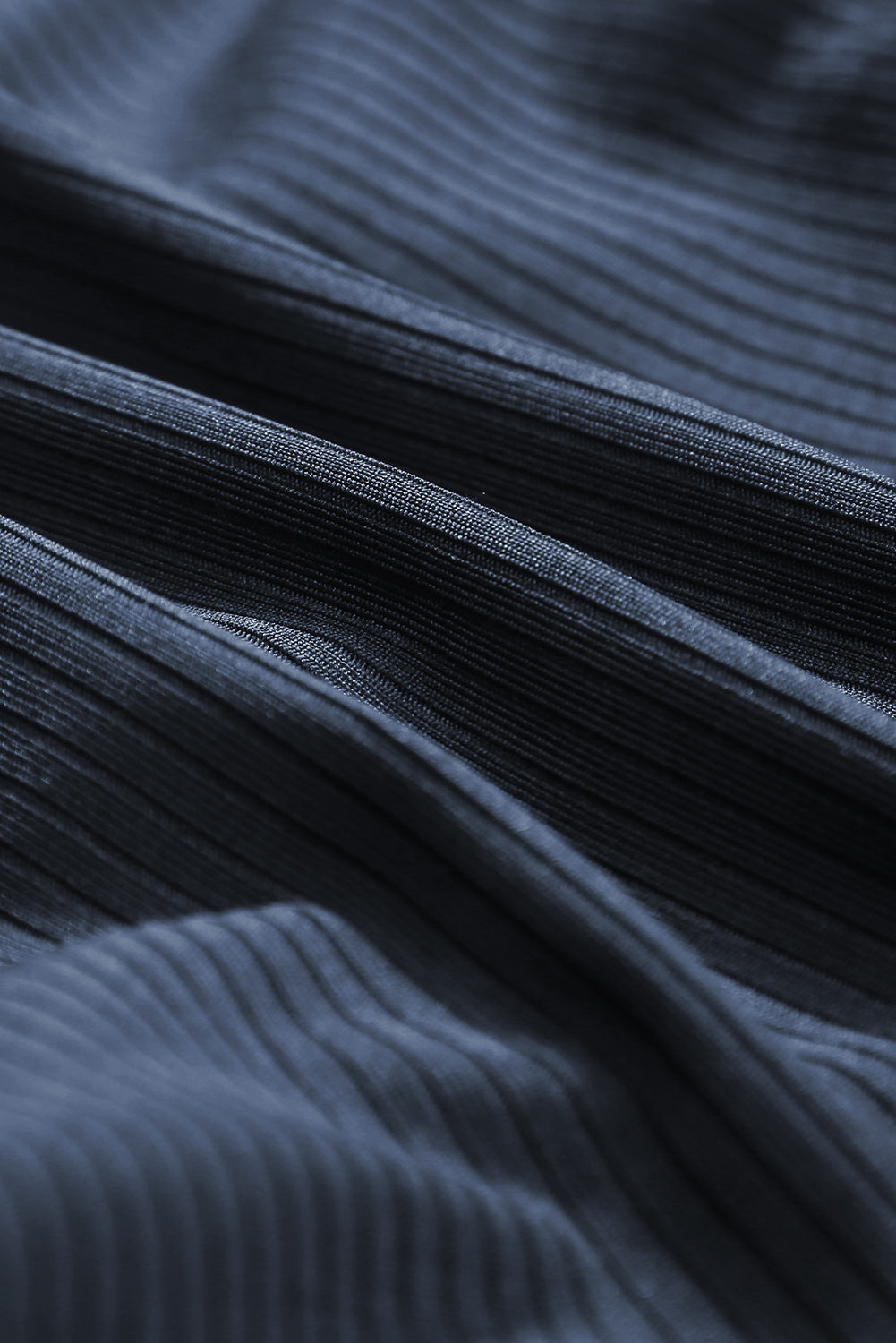 Maillot de bain une pièce bleu marine côtelé avec cordon de serrage et découpes sur les côtés