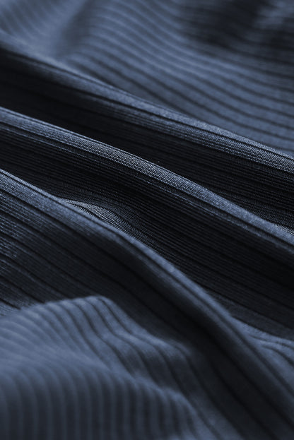 Maillot de bain une pièce bleu marine côtelé avec cordon de serrage et découpes sur les côtés