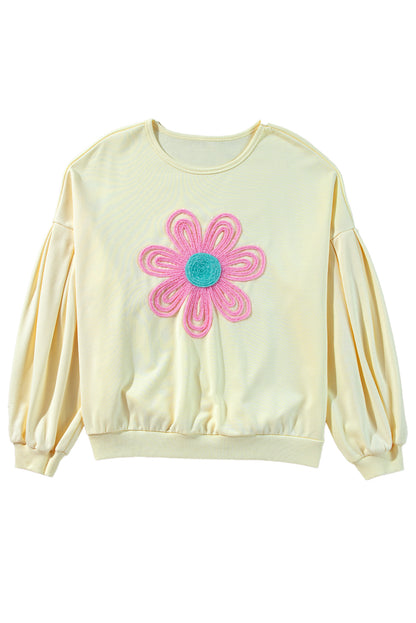 Sweat-shirt beige à manches bouffantes et fleurs en guirlandes