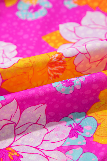 Chemisier à imprimé floral rose, manches volantées et col cranté