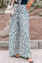 Pantalones anchos con bolsillos y estampado de leopardo