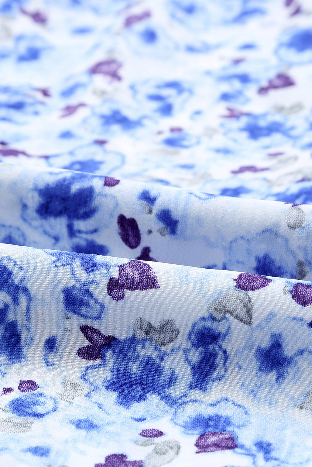 Blusa con botones y cuello en V con estampado floral 