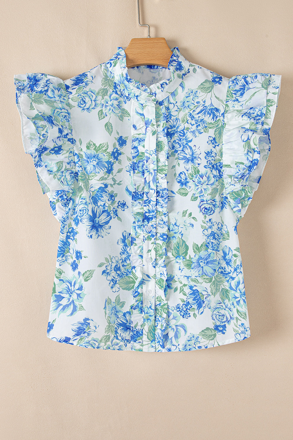 Chemise boutonnée à volants et imprimé floral bleu ciel