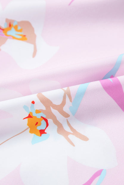 Robe longue smockée à imprimé floral rose et épaules nouées