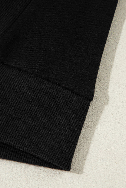 Sweat-shirt noir uni à col rond et ourlet haut-bas