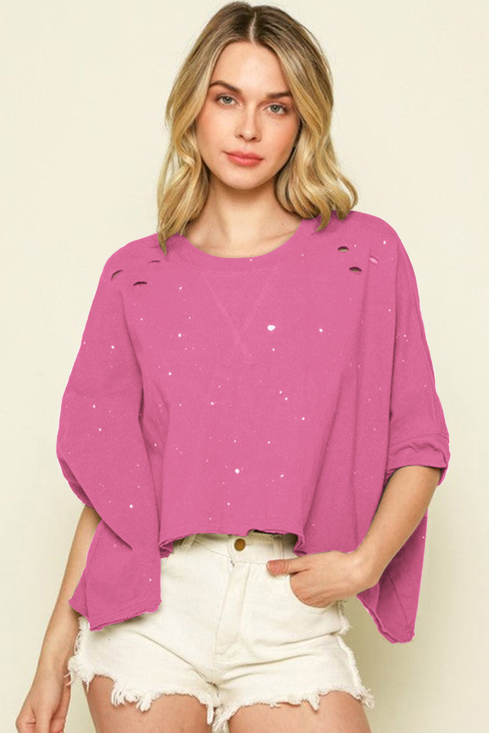 Haut à manches courtes et ourlet asymétrique délavé et vieilli