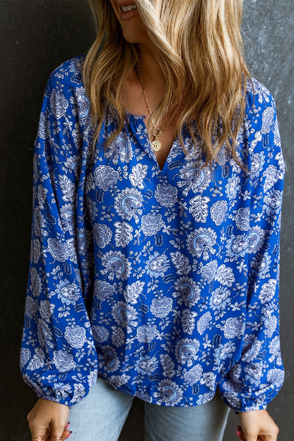Blusa de manga larga con cuello en V y muesca floral azul 