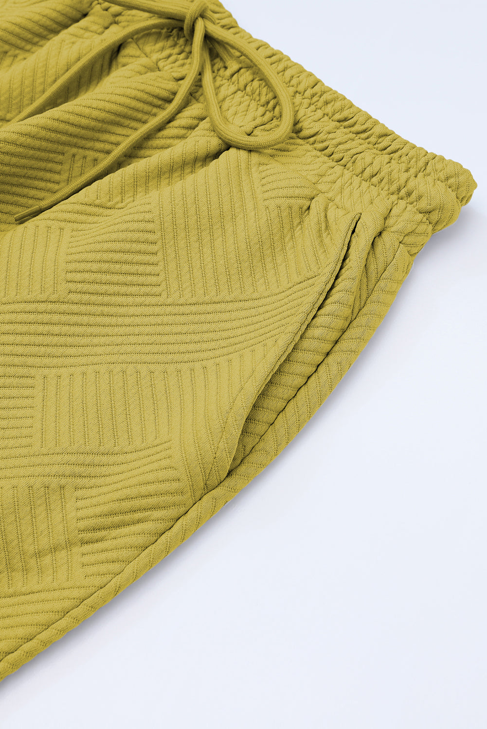 Conjunto de camiseta holgada con textura gris y pantalón con cordón