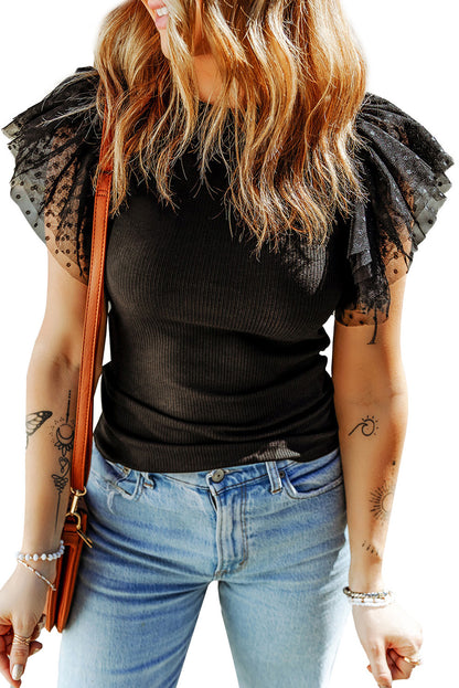 Haut en maille côtelée à volants et manches en maille à pois