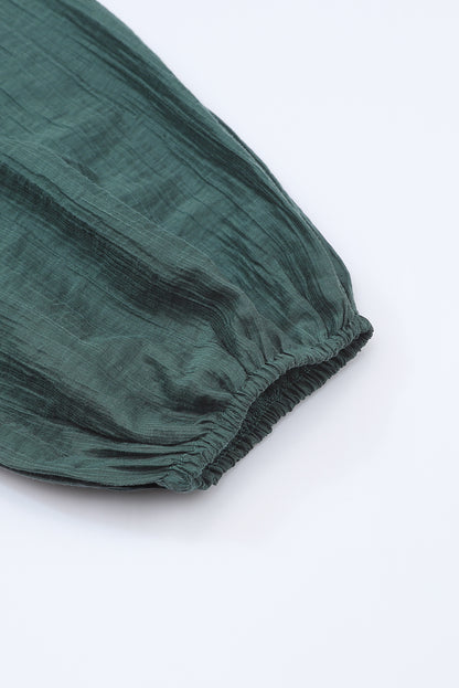 Minivestido negro con cuello cuadrado y manga abullonada