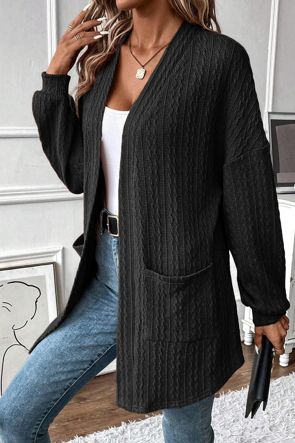 Cardigan ouvert sur le devant en tricot texturé noir avec poches latérales