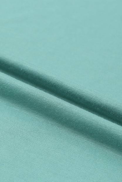 Tunique à manches courtes avec poches latérales 