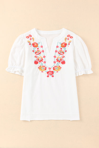 Blusa de manga farol con volantes y bordado floral 