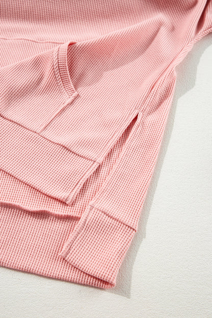 Sweat à capuche surdimensionné rose clair en tricot gaufré doublé polaire à col montant