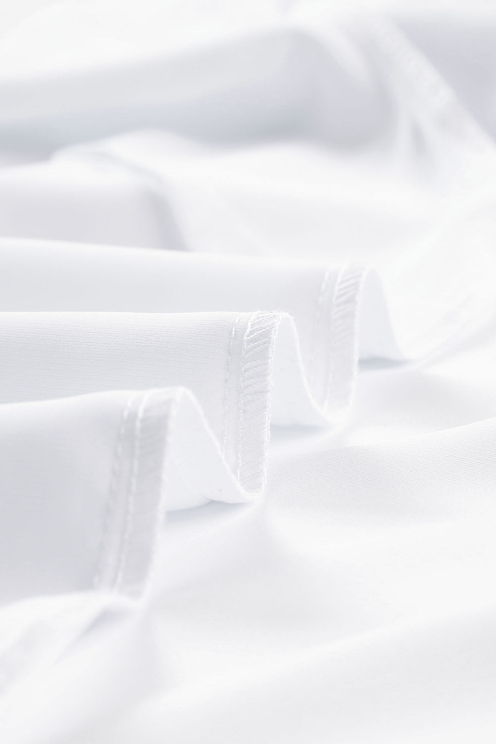 Blusa con cuello en V y media manga de color liso