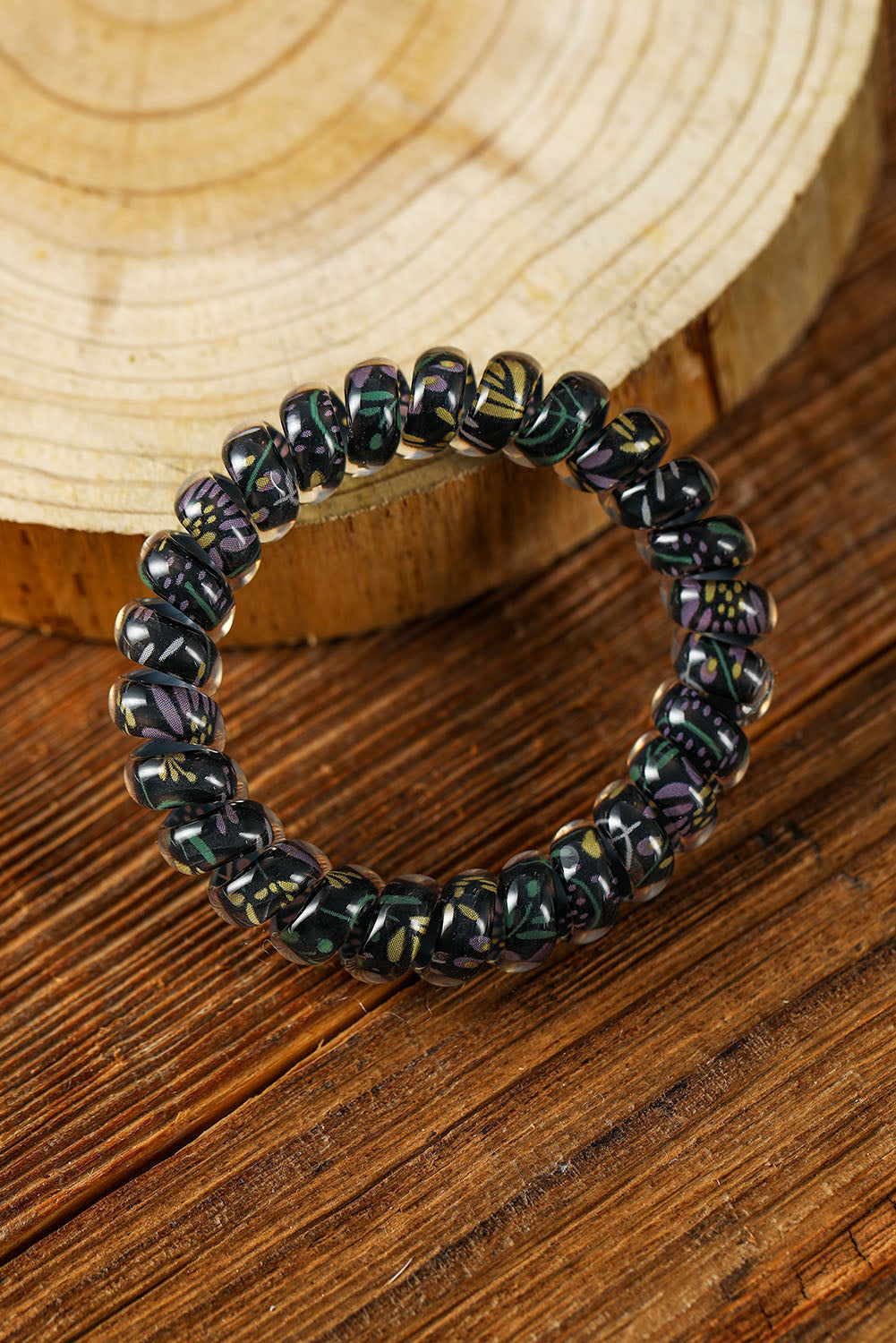 Coletero con cordón para teléfono floral negro