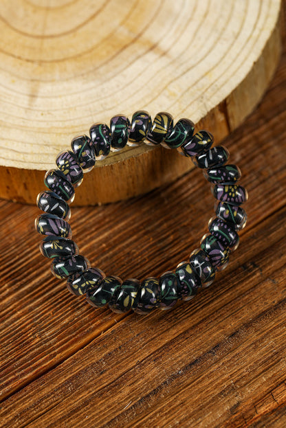 Coletero con cordón para teléfono floral negro