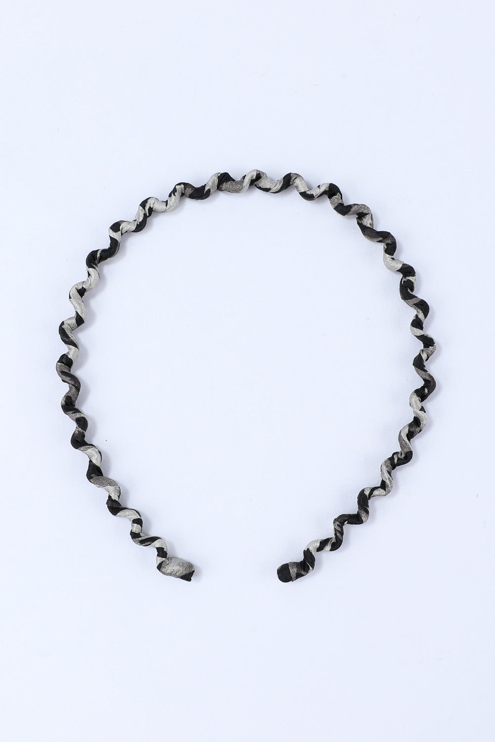 Diadema ondulada con estampado de leopardo vintage negro 