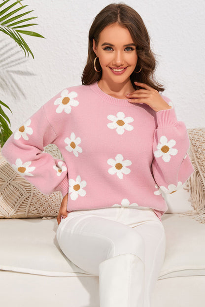 Pull à épaules tombantes et motif floral rose 