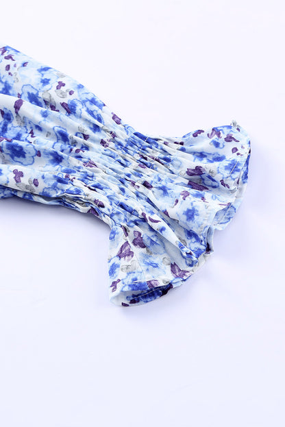 Blusa con botones y cuello en V con estampado floral 