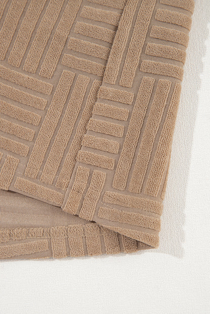 Veste boutonnée texturée kaki foncé avec poche poitrine