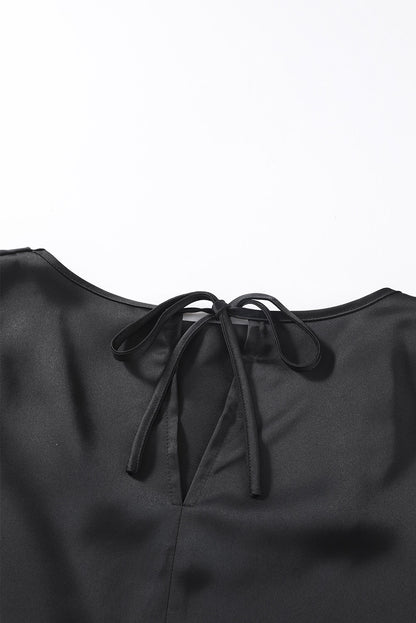 Blusa elegante de manga larga con cuello vuelto negro