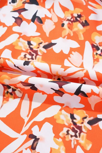 Robe mi-longue orange à imprimé floral, col en V, manches bouffantes, grande taille