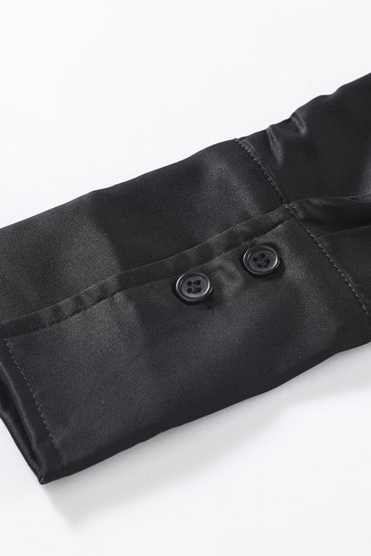 Blusa elegante de manga larga con cuello vuelto negro