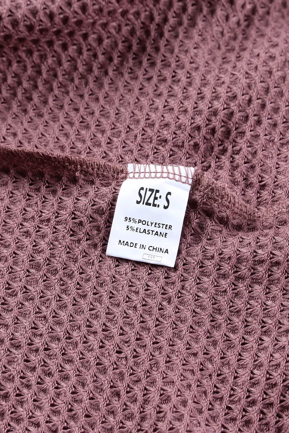 Top holgado de manga larga de punto tipo gofre 