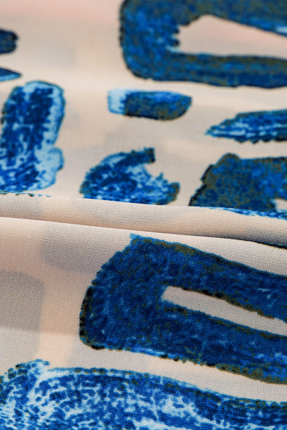 Mini-robe boutonnée à manches bouffantes et imprimé abstrait beige