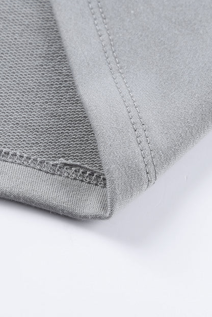 Haut ample à col large et manches chauve-souris 