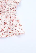 Blusa peplum con cintura fruncida y hombros descubiertos con estampado floral