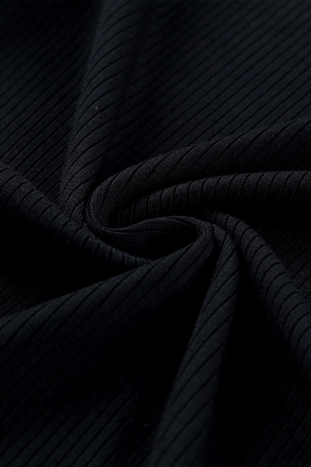 Haut en maille côtelée à volants et manches en maille à pois