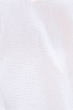 Conjunto de blusa holgada con cuello en V y pantalones cortos con dobladillo sin rematar con cordón 