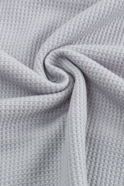 Haut en tricot gaufré à manches contrastées et imprimé léopard sauvage